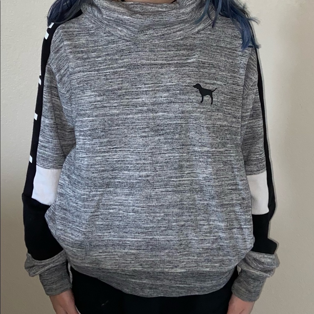 Victoria Secrets Pink Sweatshirt with a cow neck.